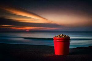 a red bucket on the beach with a sunset in the background. AI-Generated photo