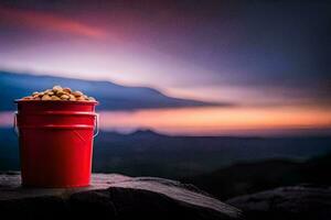 a red bucket of peanuts on a rock in the mountains. AI-Generated photo