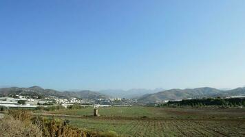 Fields, village and mountains in a typical Andalusian village a sunny day video