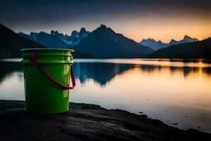 a green bucket sits on the shore of a lake at sunset. AI-Generated photo