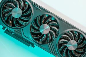 modern powerful gaming graphics card for a computer with three fans photo