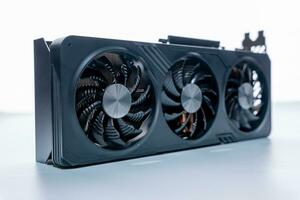 modern powerful gaming graphics card for a computer with three fans photo