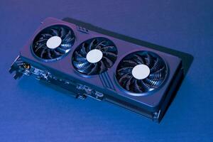 modern powerful gaming graphics card for a computer with three fans photo