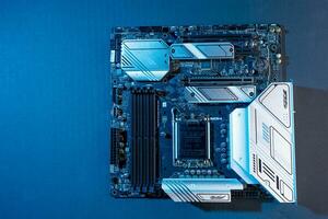 modern powerful and fast motherboard with slots for memory and CPU photo