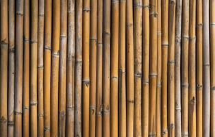 Old bamboo plank fence texture material construction for background. photo