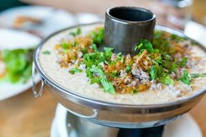 Steamed Egg.Kaithoon  Egg soup pork on a hot pot photo