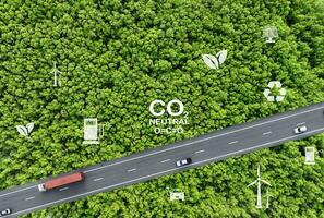 Renewable, sustainable energy for electric vehicle. Sustainable transportation. EV car charging battery with clean energy from sun and wind. Green technology. Net zero emission and carbon neutrality. photo