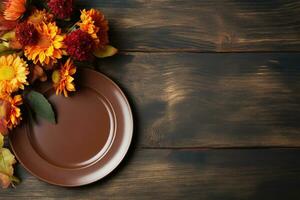 Thanksgiving background with empty plate and flowers on rustic wood table. Top view, copy space AI Generative photo