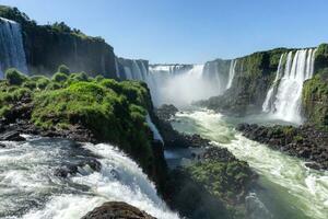 Iguazu Falls is a series of waterfalls on the border of Brazil and Argentina photo