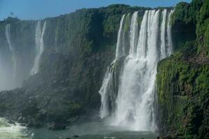 Iguazu Falls is a series of waterfalls on the border of Brazil and Argentina photo