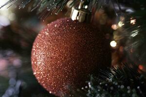 Christmas decorations on a Christmas tree, during the festive period in December in Italy photo