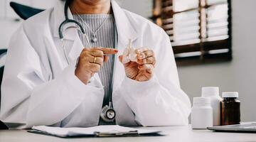 Female doctor holding virtual Lungs in hand. Handrawn human organ, copy space on right side, raw photo colors. Healthcare hospital service concept stock photo