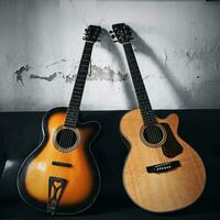 A vintage and a modern guitar photo