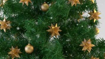 christmas tree with gold stars and ornaments video