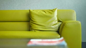 modern yellow sofa with pillows in living room at home video