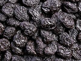 background of chocolate prunes texture photo