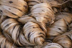 Thick Golden bundle of raw jute fiber abstract Pattern Texture Can be used as a Background wallpaper photo