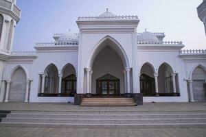 The most Beautiful architectural Elias Ahmed Chowdhury College Jame Masjid in Bangladesh under the Blue sky photo