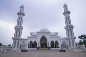 The most Beautiful architectural Elias Ahmed Chowdhury College Jame Masjid in Bangladesh under the Blue sky photo