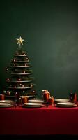 Christmas Tree and Festive Table Setting on Red Tablecloth photo