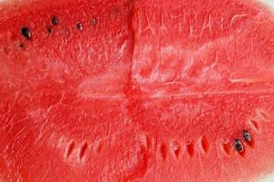 Red watermelon texture background image, rich in nutrients that are beneficial to health. photo