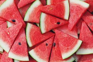 Red watermelon texture background image, rich in nutrients that are beneficial to health. photo