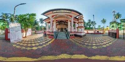 full hdri 360 panorama near hindu temple of goddess laxmi in jungle among palm trees in Indian tropic village in equirectangular projection. VR AR content photo