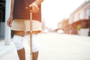 Asian senior Elderly man have knee pain and bone problems. photo