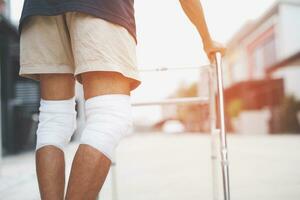 Asian senior Elderly man have knee pain and bone problems. photo