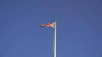 england flag on flagpole in london video
