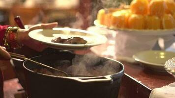 Typical Brazilian feijoada in a self-service style video