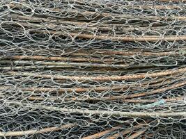 pile of steel wire with fishing net photo
