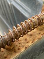 close up shot of a rusty metal pipe photo