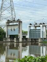 power plant and dam in the water photo