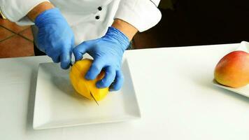 Chef cutting a mango fruit video