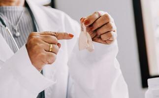 Female doctor holding virtual Lungs in hand. Handrawn human organ, copy space on right side, raw photo colors. Healthcare hospital service concept stock photo