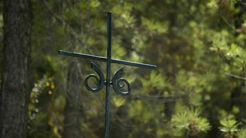 Ancient spanish iron cross in a road of a village of andalusia video