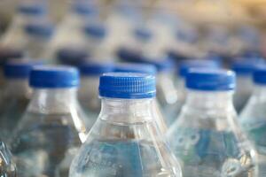 mineral water bottle in a row photo