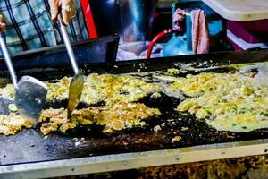 Detail of food on a grill photo