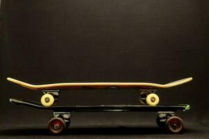 Isolated stacked skateboards photo