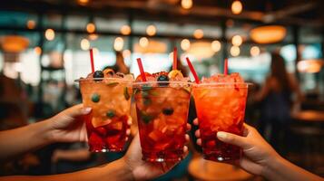 Group of young friends saying cheers holding tropical blended colorful delicious fruit drinks. AI Generated photo