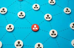 Red highlighted person in the network. Working relationships and involvement in work. Participation in a common project. Communication and cooperation. photo