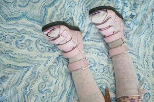 Child cerebral palsy disability, legs orthosis. photo