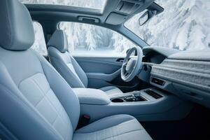 Frozen car interior. Driving in winter season. Generative AI photo