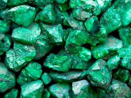 natural green gemstone as background. photo