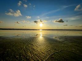 Beautiful evening sunset over the sea beach photo