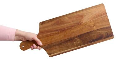 Female hand holding a rectangular wooden cutting board kitchen board photo