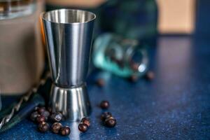 Dried juniper berries on a checkered fabric. Copy space photo