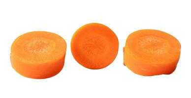 Beautiful orange  carrot slices in set isolated on white background with clipping path photo