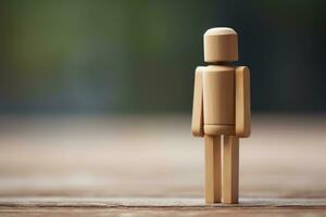 Sad and lonely wooden man on a wooden surface on a blurred natural background. The concept of loneliness, sadness, waiting. Generative AI photo